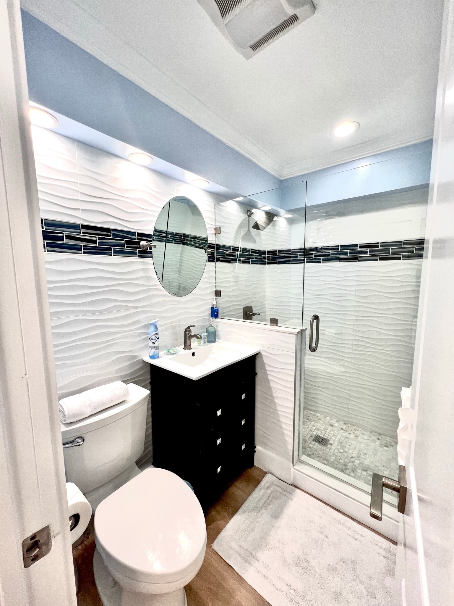 Wave Tile Bathroom with Glass Shower